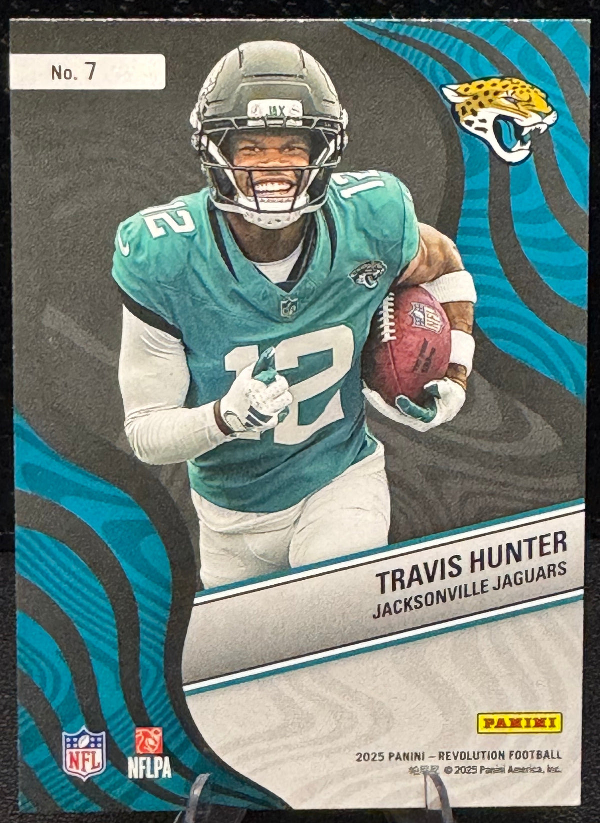 2025 Panini Revolution New Wave #7 Travis Hunter RC Jacksonville Jaguars - 787 Hobby House